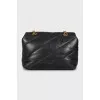 Quilted bag with gold hardware