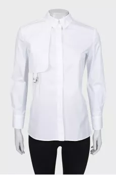 White shirt with decor on the chest