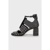 Leather shoes decorated with rhinestones
