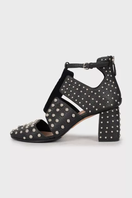 Leather shoes decorated with rhinestones