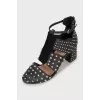 Leather shoes decorated with rhinestones