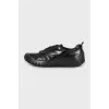 Men's black leather sneakers