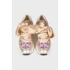 Mixed color sneakers with bow