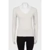 Light gray pullover with tag