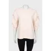 Pink blouse with voluminous sleeves
