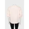 Pink blouse with voluminous sleeves