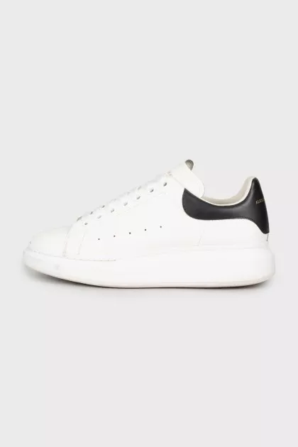 Men's black and white leather sneakers