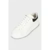 Men's black and white leather sneakers