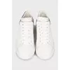Men's black and white leather sneakers