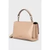 Leather crossbody bag with gold-tone hardware