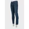 Men's blue jeans with silver hardware