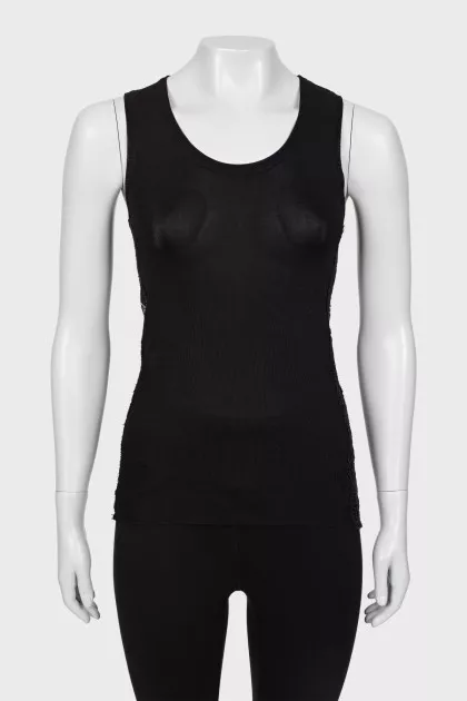 Black top with a pattern on the sides