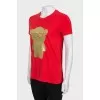 Red T-shirt with gold print