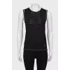 T-shirt with perforation and metal logo