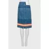 Denim skirt with decoration at the bottom
