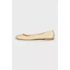 Gold embossed ballet flats