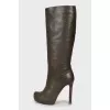 High-heeled leather boots