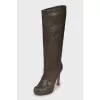 High-heeled leather boots