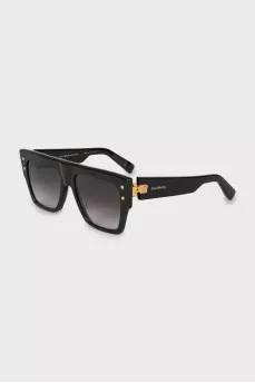 Black sunglasses with gold hardware