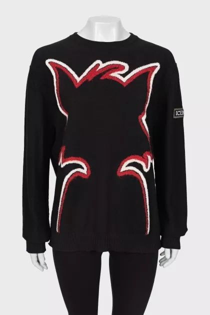 Black sweater with seams facing out