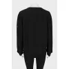 Black sweater with seams facing out