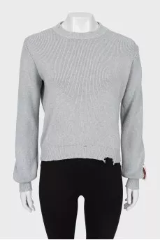 Gray sweater with ripped effect
