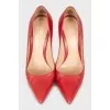 Red pointed toe shoes