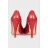 Red pointed toe shoes
