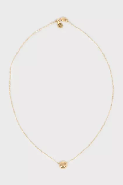 Round gold pendant