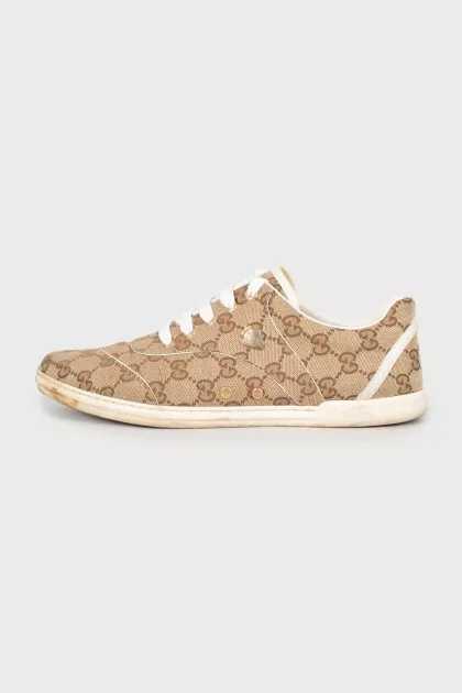 Textile sneakers in a signature print
