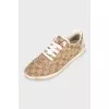 Textile sneakers in a signature print