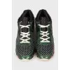 Sneakers in a combined print