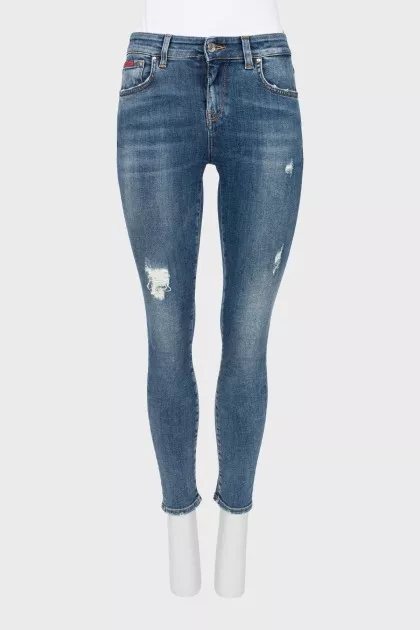 Skinny jeans with ripped effect