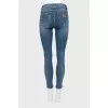 Skinny jeans with ripped effect