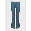 Flared jeans with stripes