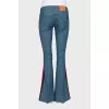 Flared jeans with stripes