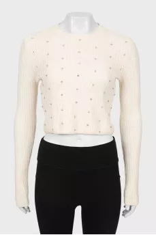 Cashmere sweater decorated with rhinestones