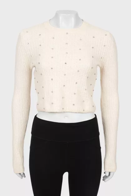 Cashmere sweater decorated with rhinestones