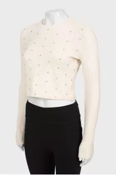 Cashmere sweater decorated with rhinestones