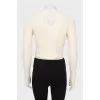 Cashmere sweater decorated with rhinestones