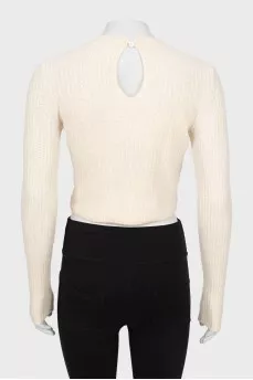 Cashmere sweater decorated with rhinestones