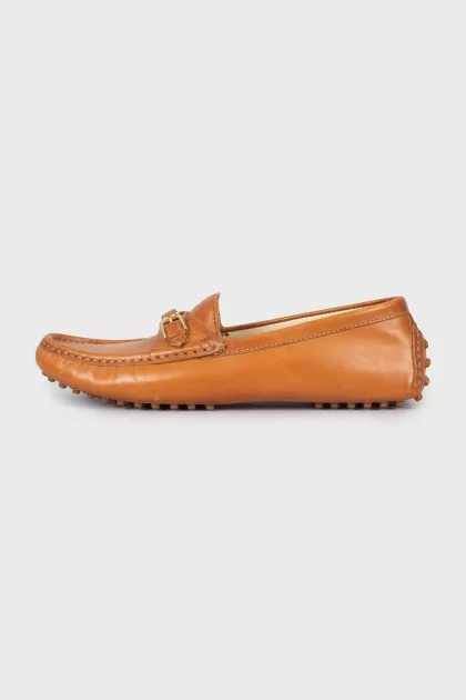 Leather loafers with gold hardware