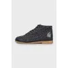 Boots with embroidered logo on toe