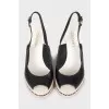 Wedge sandals decorated with chain