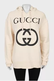 Beige hoodie with brand logo
