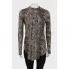 Animal print blouse with brooch