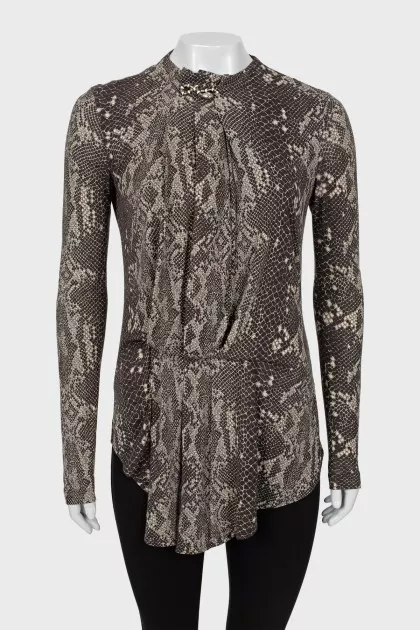Animal print blouse with brooch