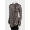 Animal print blouse with brooch