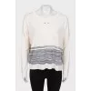 Wool sweater with brooch