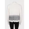 Wool sweater with brooch